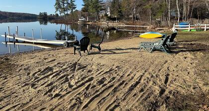 4-bedroom lake house in serene Raymond with WiFi, AC. Relax and unwind.
