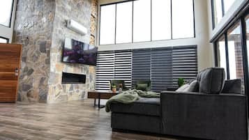 Deluxe House, Garden View | Living area