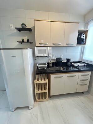 Apartment | Private kitchen | Fridge, microwave, stovetop, blender