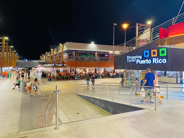 A shopping center with a prominent sign for Puerto Rico.
