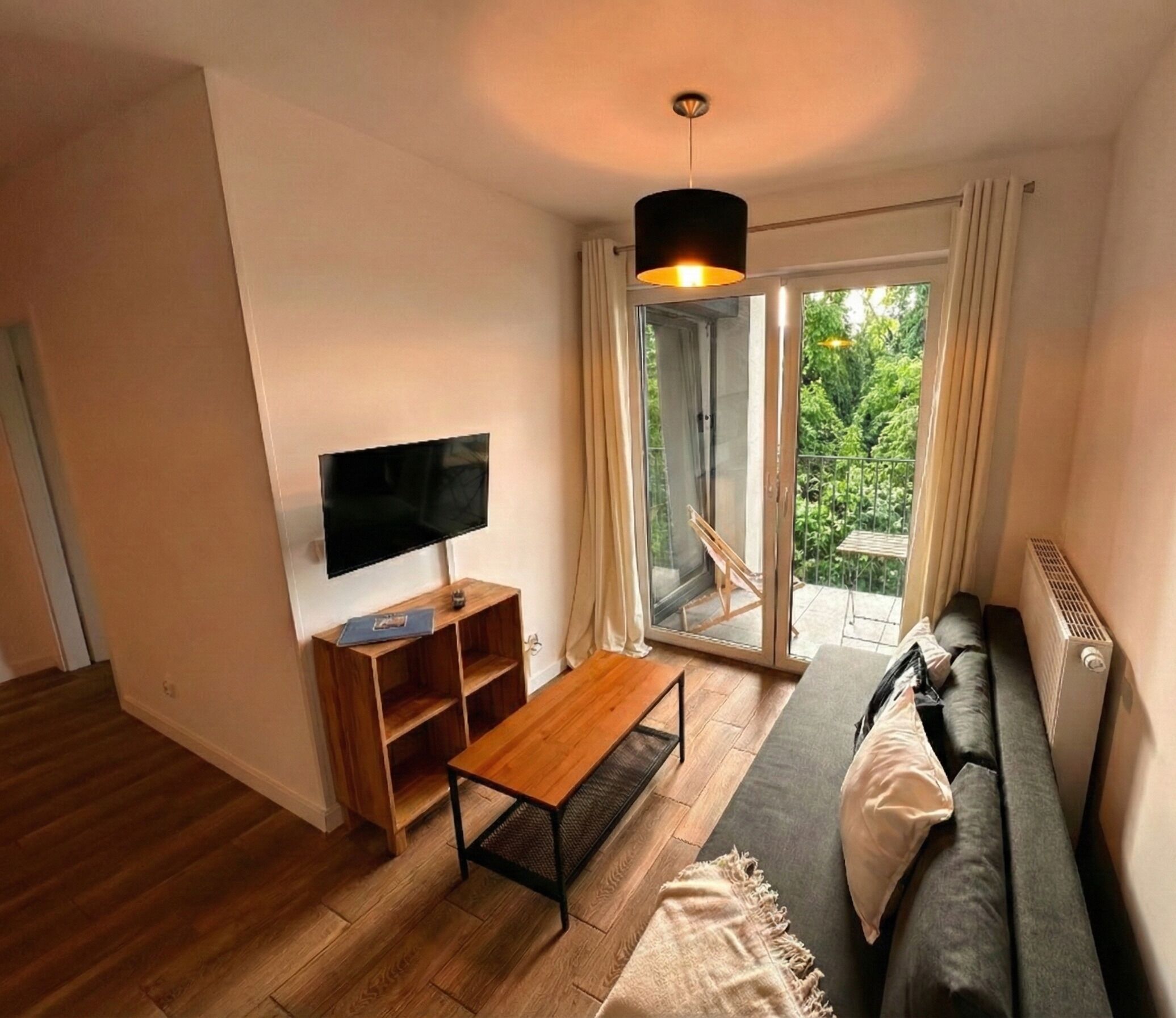 Comfort Apartment | Living area | 32-inch LED TV with digital channels, streaming services