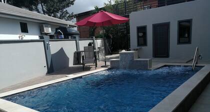 Cozy 1-bedroom apartment with WiFi, AC in gated community in Arima. Adults only