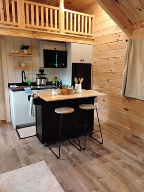 Fridge, microwave, stovetop, coffee/tea maker