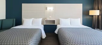 Affordable hotel suites with WiFi, AC in charming McDonough
