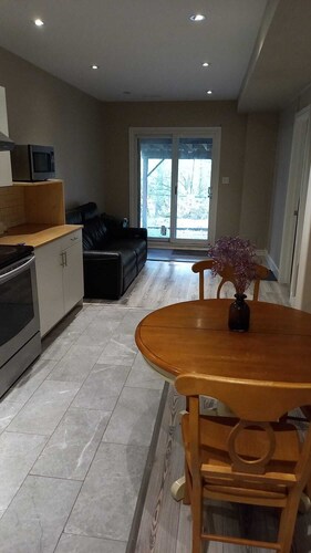 Airy, spacious, nature facing walk-out suite