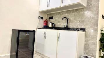 Departamento | Cocina privada | Frigobar, microondas y tetera eléctrica