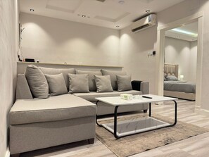 Apartamento | Área de estar | Smart TV