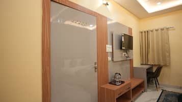 Executive Double Room | Laptop workspace, blackout drapes, iron/ironing board, free WiFi