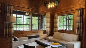 TV, fireplace - Blockhaus mit Blick auf die Weide, Eschede (Eschede)