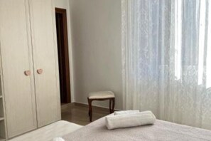 1 chambre, fer et planche Ă repasser, Wi-Fi gratuit, draps fournis