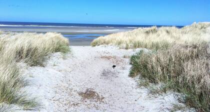 bungalow, situated directly at a large sand dunes
