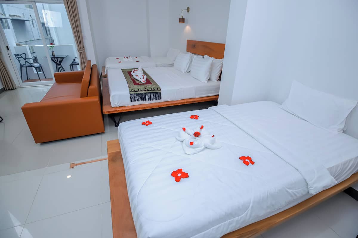 Family Triple Room, City View | Premium bedding, in-room safe, soundproofing, free WiFi