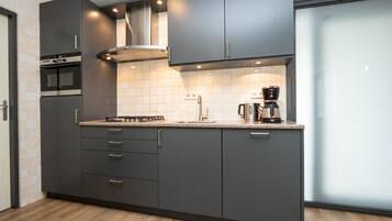 Fridge, microwave, dishwasher, coffee/tea maker