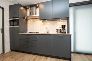 Fridge, microwave, dishwasher, coffee/tea maker