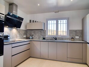 Fridge, microwave, oven, cookware/dishes/utensils
