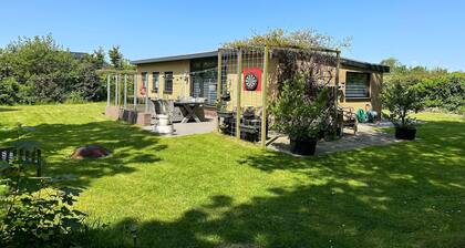 Beau bungalow avec jardin spacieux