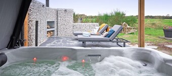 Holiday home near forest with wellness garden