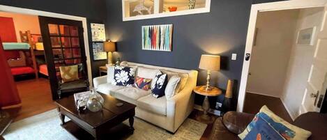 Signature Condo, 3 Bedrooms, Kitchen, City View | Living room | 49-inch Smart TV with cable channels