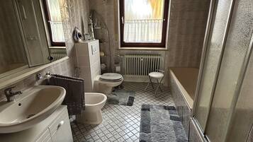 Hair dryer, bidet, towels, soap