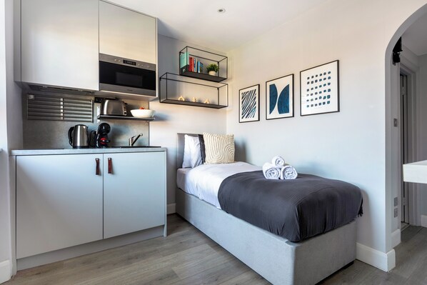 Departamento, 1 habitación, para no fumadores, vista a la ciudad | 1 habitación, tabla de planchar con plancha y wifi gratis 