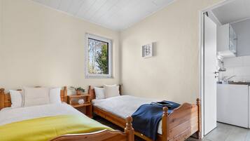 1 chambre, fer et planche Ă repasser, draps fournis