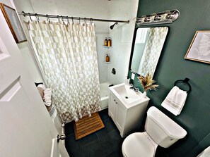 Hair dryer, towels, soap, shampoo