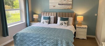 Family friendly Muscovy Suite for 4 with kitchenette. Pet friendly. Outdoor pool