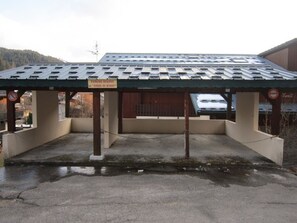A parking garage with a sign indicating a parking reserve.