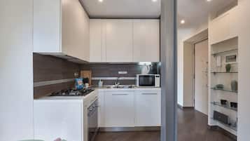 Dúplex familiar, vista a la ciudad | Cocina privada