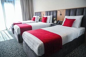 Triple Room, Balcony, City View | In-room safe, desk, laptop workspace, blackout drapes - Landmark Hotel (Batumi)