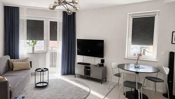 Comfort Apartment, Balcony, City View | 1 bedroom, in-room safe, laptop workspace, blackout drapes