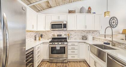 Sunset Landing: Waterfront Luxury Condo with High End Finishes Throughout