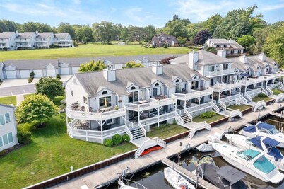 Sunset Landing: Waterfront Luxury Condo with High End Finishes Throughout