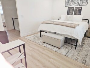 2 bedrooms, desk, iron/ironing board, travel crib