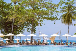 2 outdoor pools, open 10:00 AM to 9:00 PM, free cabanas, pool umbrellas