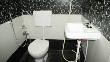 Shower, towels, soap, toilet paper