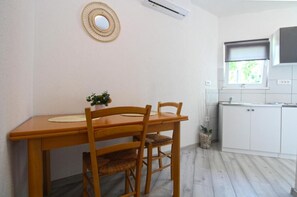 Apartment, 1 Bedroom, Terrace, Garden View | Dining room - Cozy Apartment With Patio and Parking (Fazana)