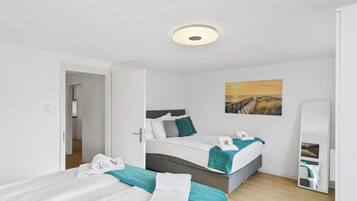 4 dormitorios, tabla de planchar con plancha, cuna de viaje y wifi