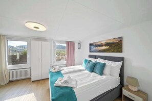 4 bedrooms, iron/ironing board, travel cot, WiFi