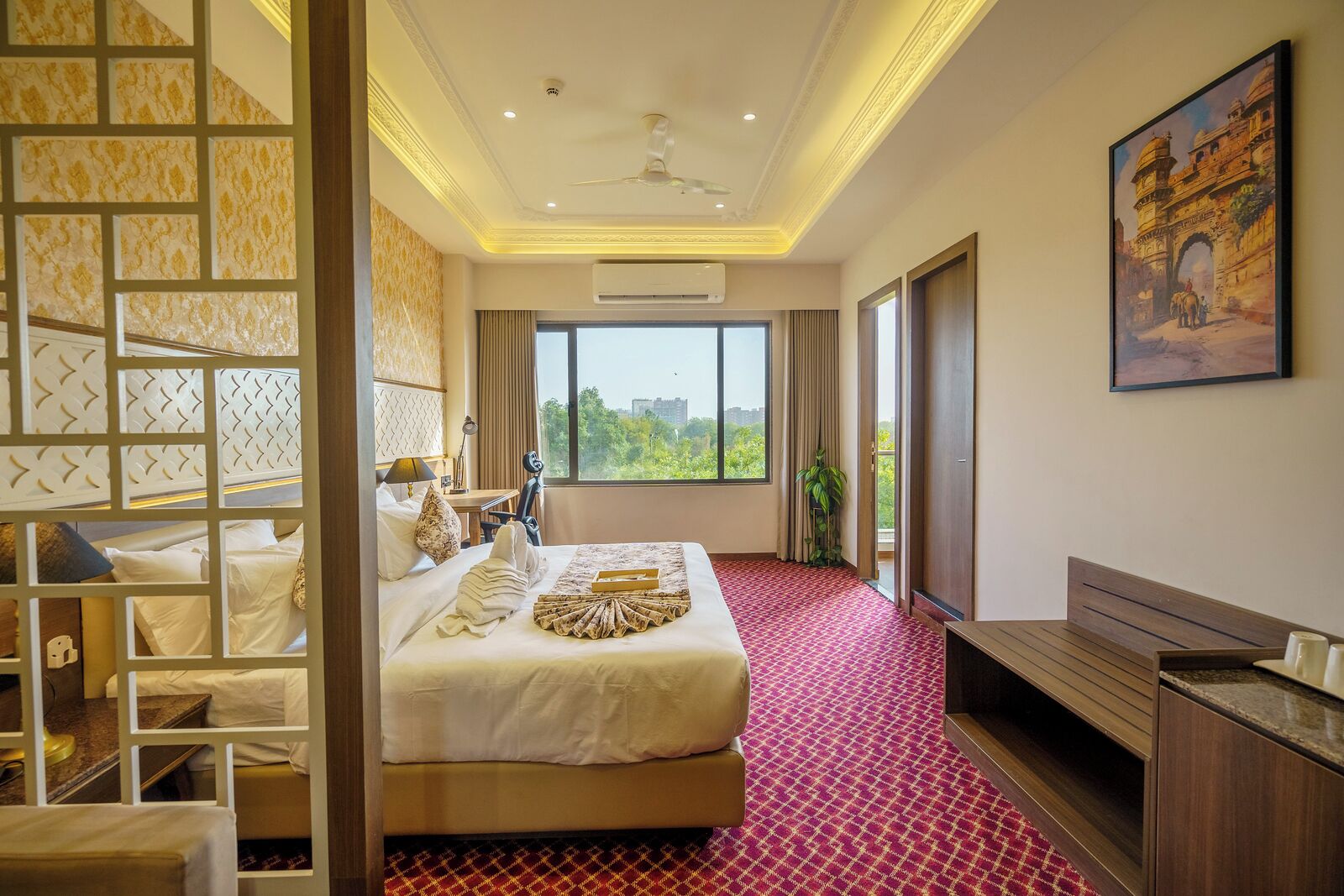 Luxury Studio Suite, Balcony, Park View | In-room safe, desk, laptop workspace, iron/ironing board