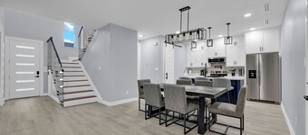 Relax + Unwind in this Modern & Spacious Townhome With 2 Car Garage