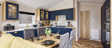 Fridge, microwave, cookware/dishes/utensils