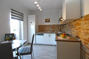 Apartamento, 1 quarto, terraço, vista para o jardim | Parte interna