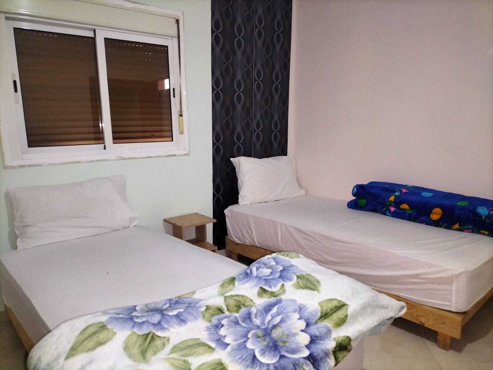 Economy Triple Room, City View | Blackout drapes, free WiFi, bed sheets