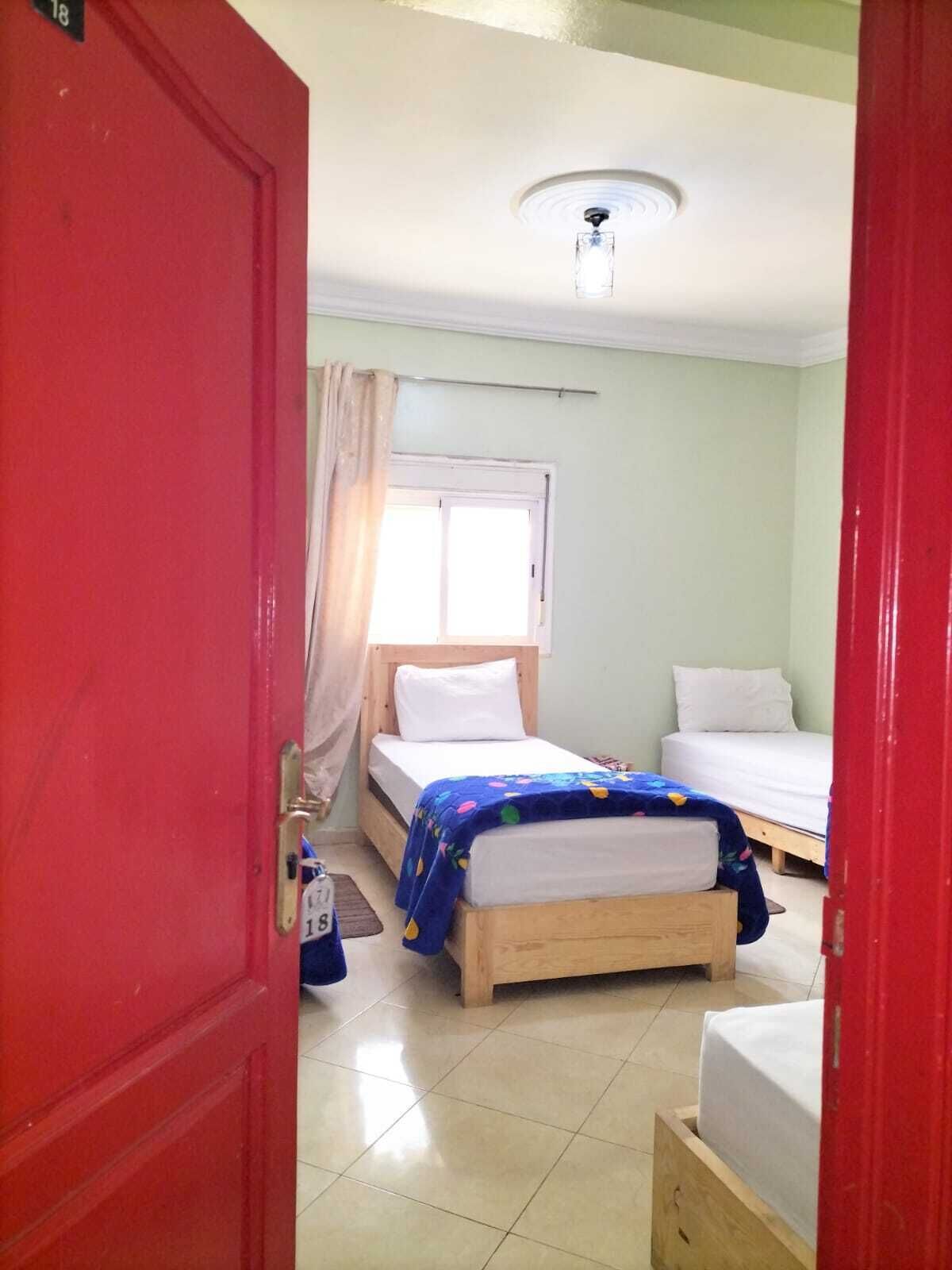 Economy Triple Room, 2 Bedrooms, Housekeeping | Blackout drapes, free WiFi, bed sheets