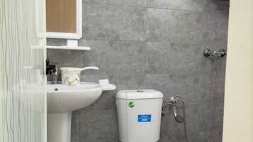 Economy Triple Room, City View | Bathroom | Shower, rainfall showerhead, bidet, toilet paper