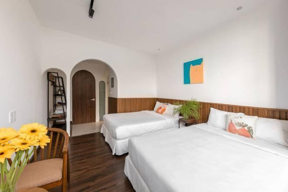 Premium bedding, desk, laptop workspace, blackout curtains