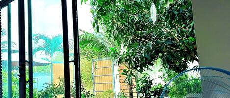 Familiekamer, uitzicht op tuin | Terras