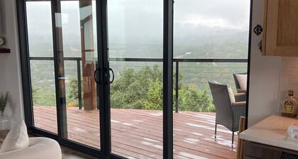 Newly constructed Beauty perched on a cliff with Panoramic Views and Sunsets!