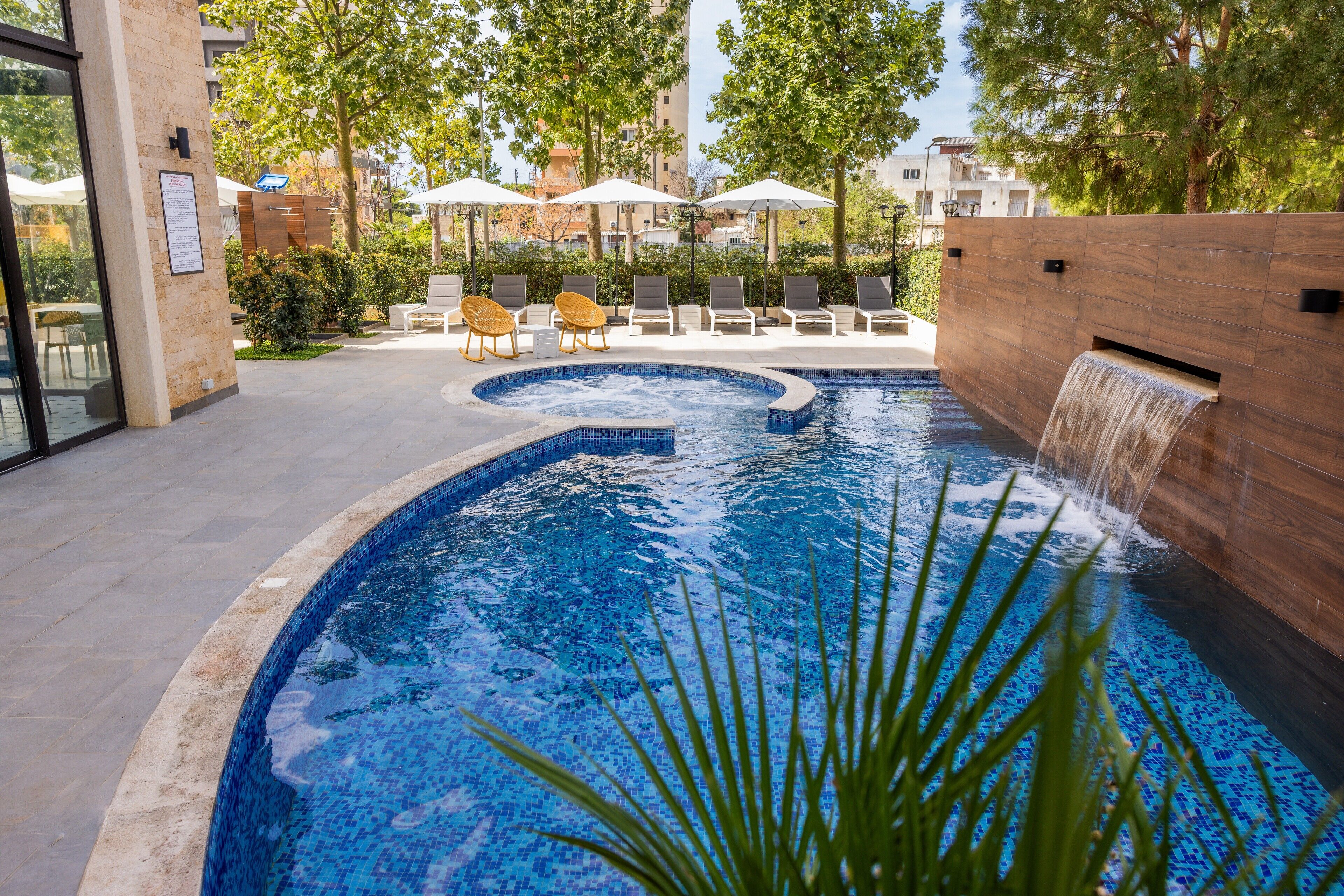 Outdoor pool, pool umbrellas, sun loungers